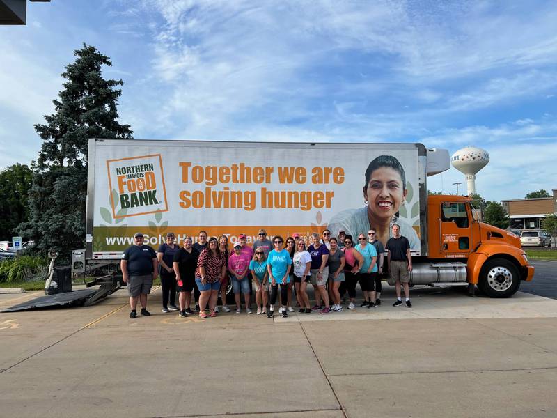 On June 22, the Council for Working Women, a division of the Joliet Region Chamber of Commerce donated and distributed a semi-truck load of food – approximately $1,500 worth of food to the St. John Lutheran Church Food Pantry in Joliet.