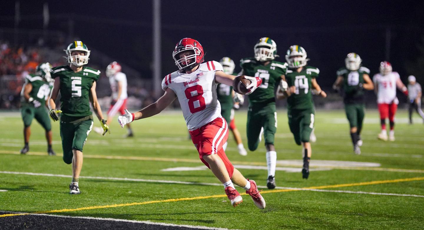Yorkville's Ryan Wulff (8) runs in for a touchdown against Plainfield Central during a football game at Plainfield Central High School on Friday, Sept. 15, 2023.