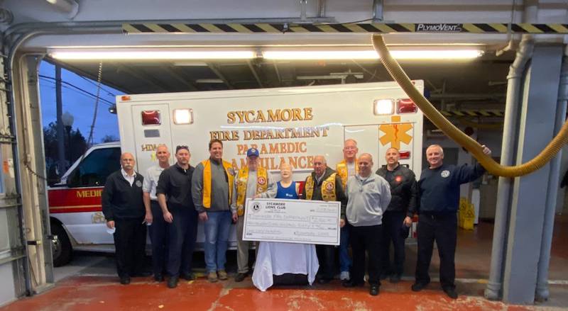 (From left to right) Fire Chief Peter Polarek, Deputy Chief Art Zern, Firefighter/Paramedic Dustin Ruby, Sycamore Lions’ Kevin Berry, President Joe Woodward, Jerry Malmassari, and Pete Springmire, Deputy Chief Dan Rink, Firefighter/Paramedics Bill Reynolds and Eric Walker (not Pictured Lion Tony Sgarlata) (Photo provided by Sycamore Fire Department)