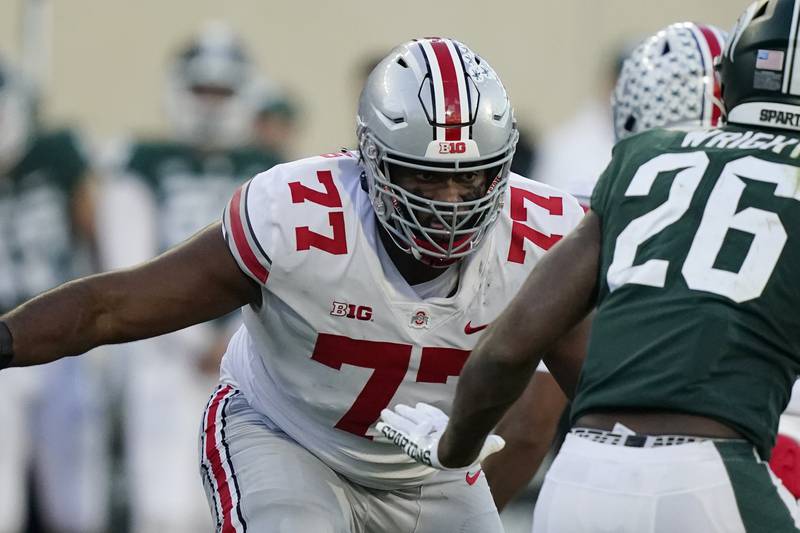Ohio State offensive lineman Paris Johnson Jr. plays against Michigan State, Saturday, Oct. 8, 2022, in East Lansing, Mich.