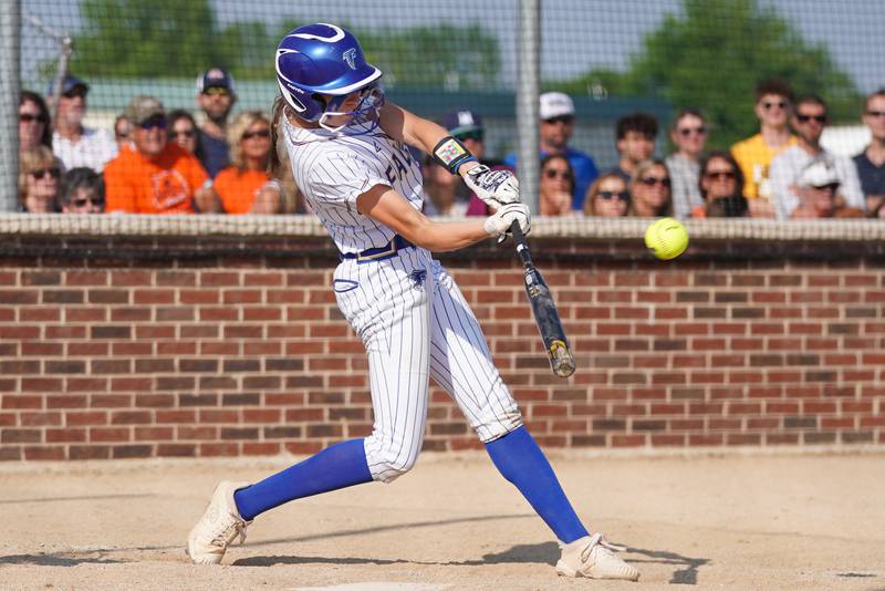 Wheaton North's Reagan Crosthwaite (21) smashes a two-run homer against Oswego during a Class 4A Oswego Sectional Final game at Oswego High School on Friday, June 6, 2025.