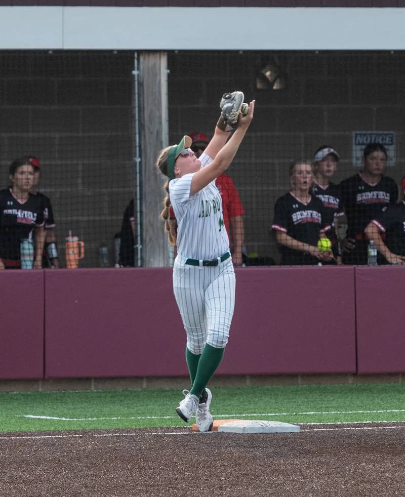 St. Bede first baseman Jillian Pinter tracks down a pop fly in Friday's sectional softball championship game in Chillicothe.