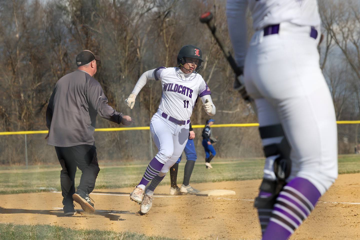 Wilmington's Molly Southall round third base to score a run during the Wildcats' 22-5 victory over Central on Wednesday, March 26, 2025.