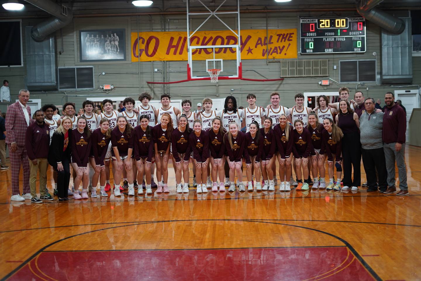 The Montini girls basketball team poses for a photo at the Hoosiers Gym in Knightstown, Ind. The Lady Broncos played in the famous gym this past weekend.