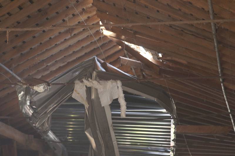A view of the damage looking underneath the Red Covered Bridge on Thursday, Nov. 16, 2023 in Princeton. Illinois Department of Transportation, Illinois State Police and Bureau County law enforcement surveyed the damage bridge after it was struck by a semi-truck.