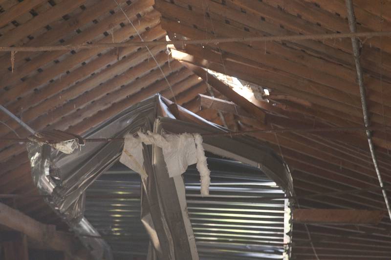 A view of the damage looking underneath the Red Covered Bridge on Thursday, Nov. 16, 2023 in Princeton. Illinois Department of Transportation, Illinois State Police and Bureau County law enforcement surveyed the damage bridge after it was struck by a semi-truck.