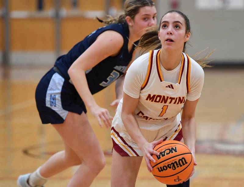 Montini’s Nikki Kerstein takes aim at the basket after slipping past Nazareth’s Stella Sakalas during a Coach Kipp Hoopsfest game on January 20, 2025 at Benet Academy in Lisle.