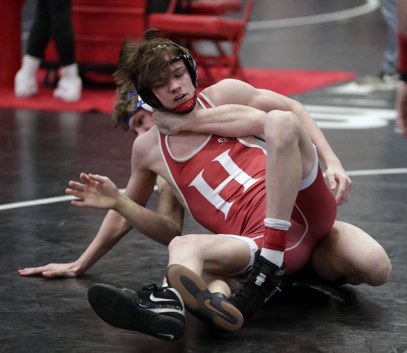 Huntley’s Sam Henkle wrestles Prospect’s Will Baysingar at 132-pounds during the IHSA 3A Individual Sectional wrestling meet at Barrington High School Saturday February 12, 2022.