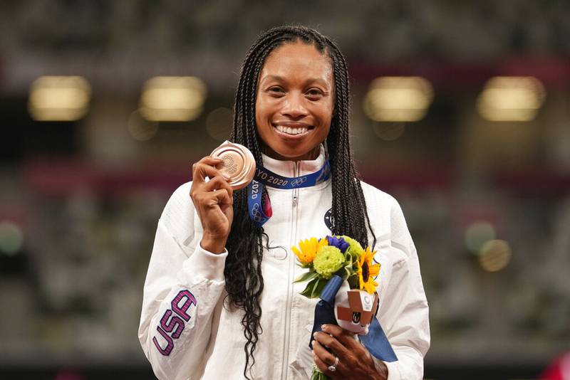 Bronze medalist Allyson Felix, of the United States, poses during the medal ceremony for the women's 400-meter run at the 2020 Summer Olympics, Friday, Aug. 6, 2021, in Tokyo.