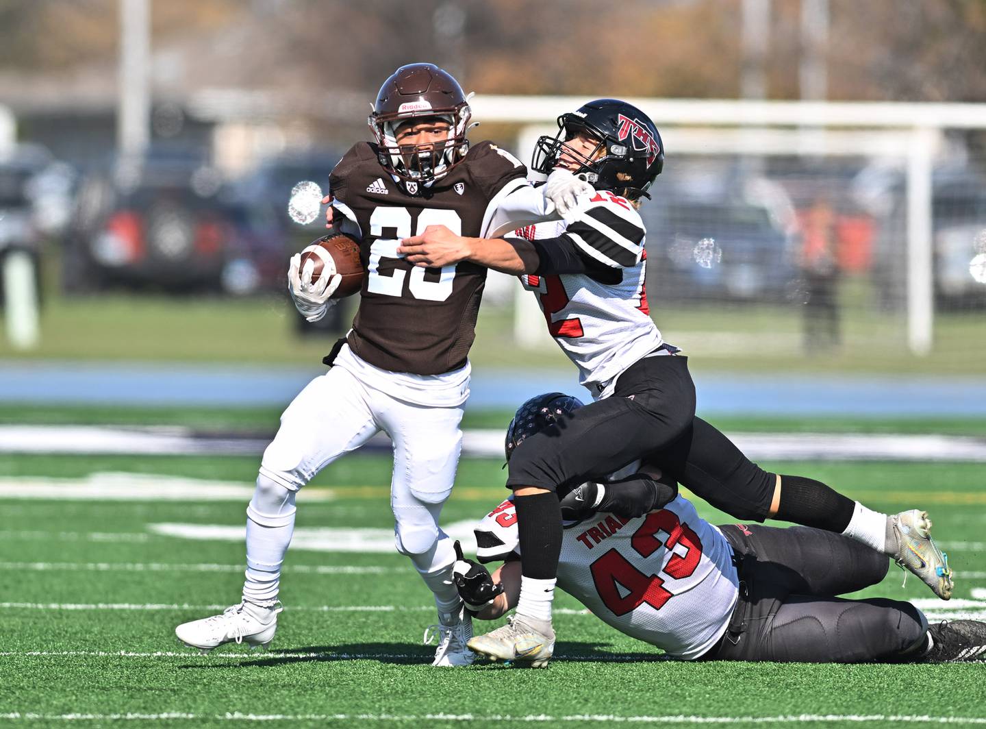 Joliet Catholic Academy's Keegan Farnaus (29) tries to elude a defender during the class 5A second round playoff game against Triad on Saturday, Nov. 04, 2023, at Joliet. (Dean Reid for Shaw Local News Network)