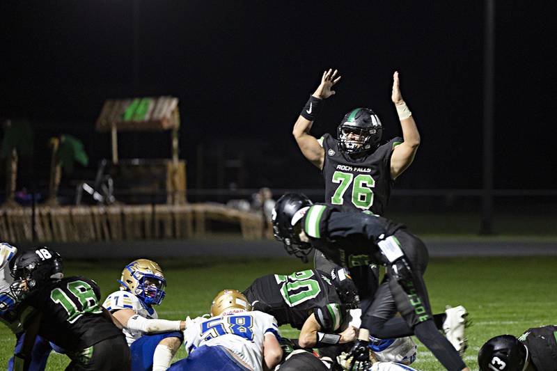 Rock Falls’ Carter Shueler signals a score as the Rockets take the lead against Rockford Christian Friday, Sept. 22, 2023 in Rock Falls.