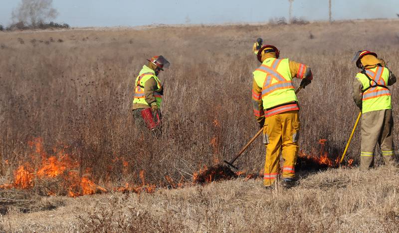 Crews from Semper FI Land Services. along with the help from the Illinois Department of Transportation, conduct a controlled burn at Deer Pit Prairie near the intersection of Interstate 39 and Illinois Route 251 on Monday, Feb. 10, 2025 near Oglesby. The burns are designed to clear out invasive plants and encourage the growth of native prairie vegetation. Other locations that IDOT has another scheduled future burns are Indian Boundary Prairie near Ohio in Bureau County.