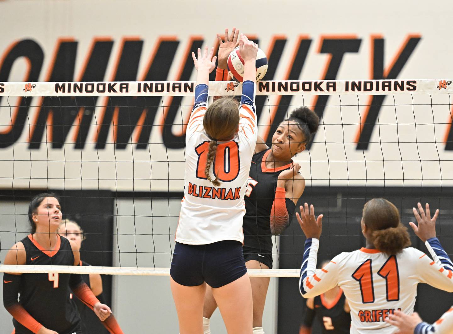 Minooka's Brooklynne Brass and Romeoville's Kameron Blizniak jousting during a conference game on Tuesday, Oct. 03, 2023, at Minooka. (Dean Reid for Shaw Local News Network)