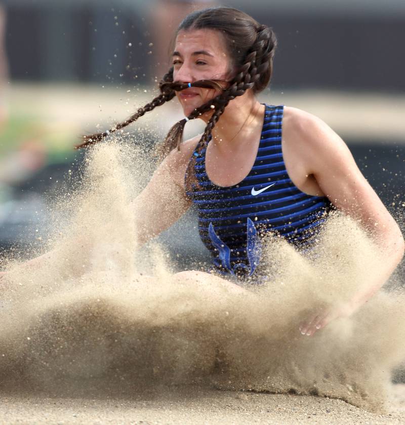 Woodstock’s Sophia Mendoza competes in the long jump in IHSA Class 2A Girls Sectional Track action at Genoa-Kingston School in Genoa on Friday, May 16, 2025.