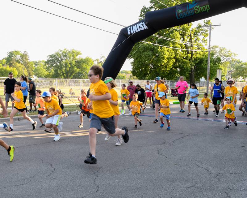 Participants of the 1 mile run took off from the starting line on Friday June 9, 2023 during the Leadershop event held in La Grange.
