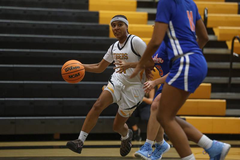 Joliet West’s Jada Perez makes a move to the baseline against Butler College Prep on Tuesday, Dec. 16, 2025 in Joliet.