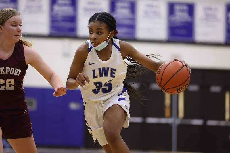 Lincoln-Way East’s Morgan Montaque drives to the basket against Lockport in the Class 4A Lincoln-Way East Regional semifinal. Monday, Feb. 14, 2022, in Frankfort.