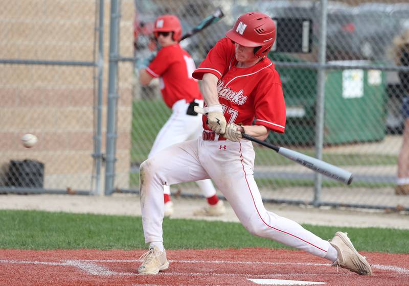 Naperville Central's Collin Hay takes a cut Monday, April 28, 2025, during their game at DeKalb High School.