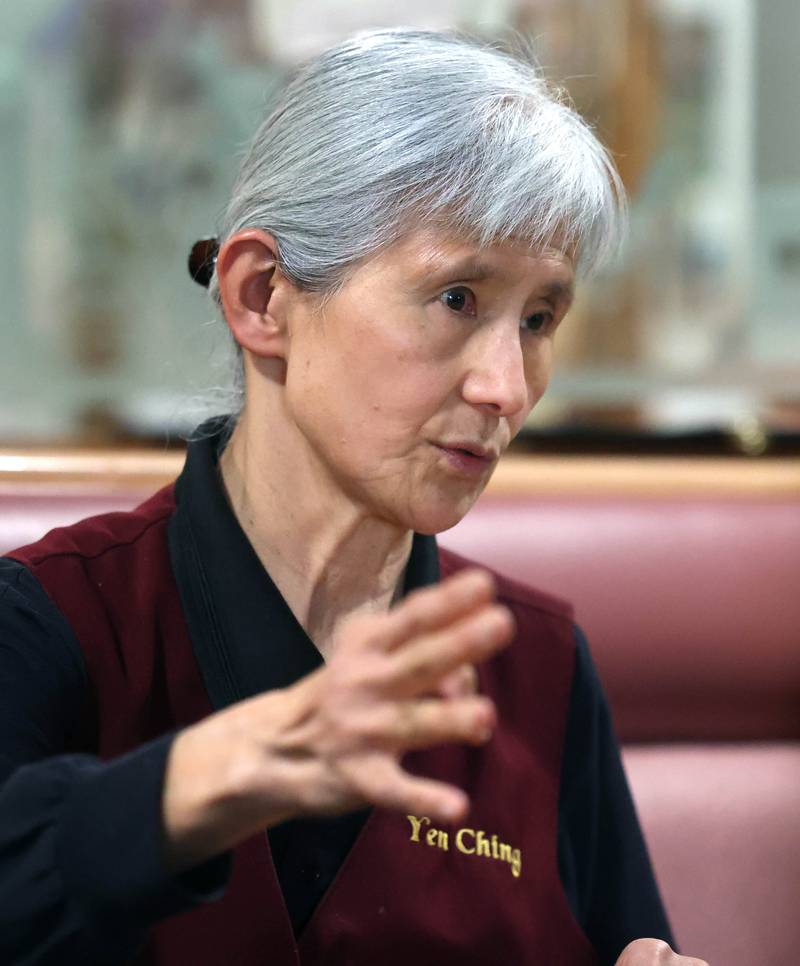 Marilyn Yin, co-owner of Yen Ching, talks Thursday Jan. 22, 2026, at the restaurant in DeKalb. The popular eatery on Lincoln Highway will be closing by the end of the year after over 40 years in business.