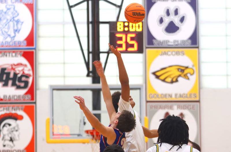 Crystal Lake South’s Gators tip off against Lakes’ Eagles in varsity boys basketball Hinkle Holiday Classic action on Friday, Dec. 26, 2025, at Jacobs High School in Algonquin.