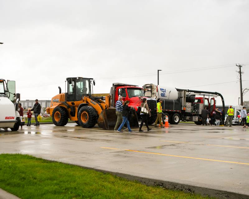 Community members get and up close look at different vehicles during the Westmont fire department 100 year anniversary celebration open house held on Saturday Oct. 14, 2023.