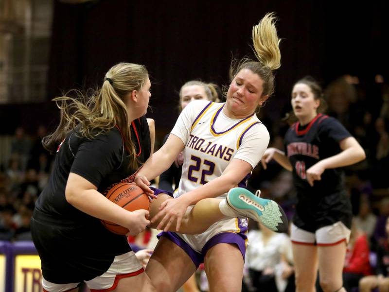 Downers Grove North’s Lilly Boor (right) and Yorkville’s Madi Spychalski go after the rebound during the Class 4A Downers Grove North Regional final on Thursday, Feb. 15, 2024.