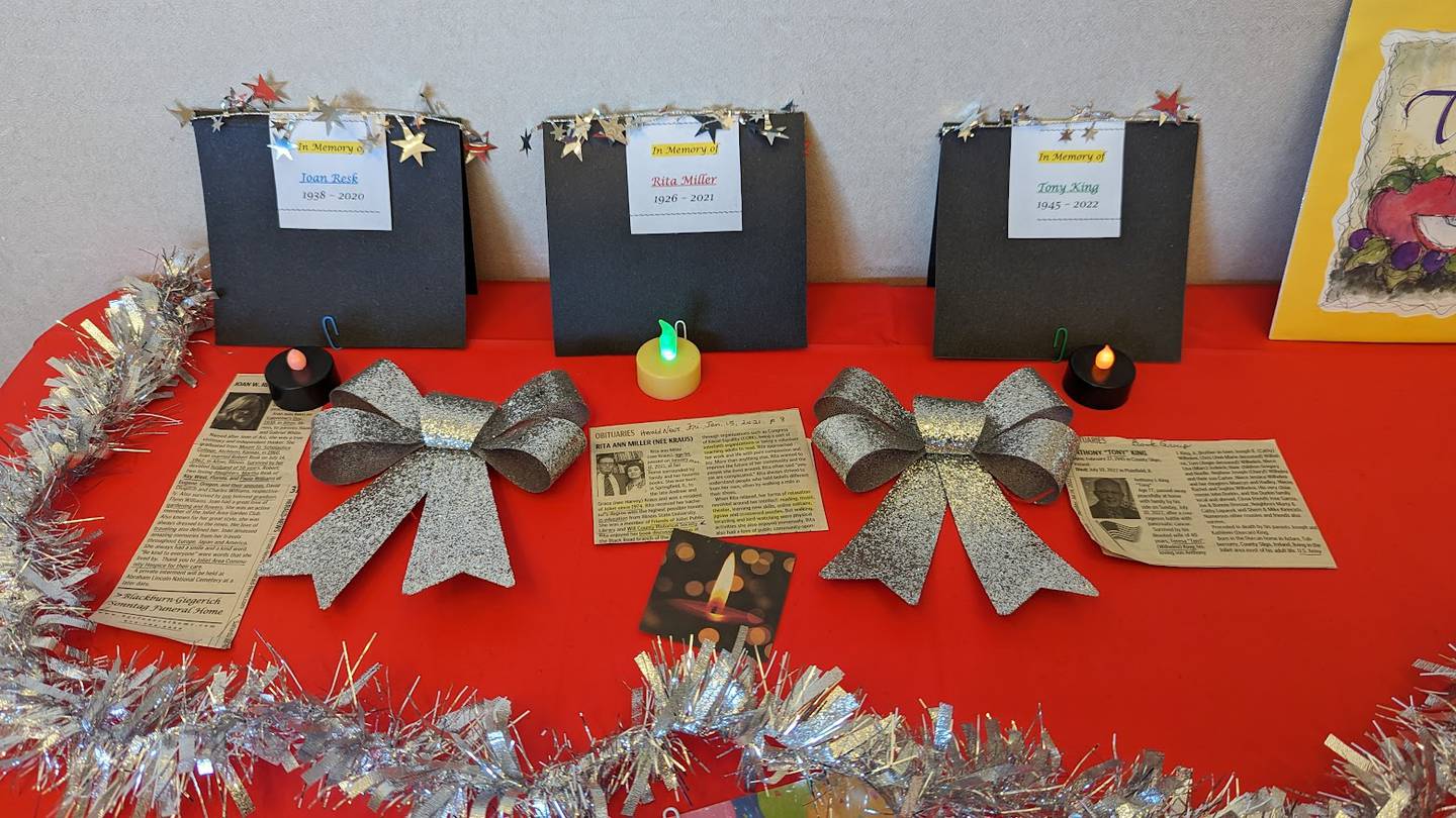 The Joliet Public Library Book Group celebrated its 25th anniversary on Tuesday with bakery from the Book and Bean Café at the Black Road branch, where book group meets. A memorial display represented members who have since died.