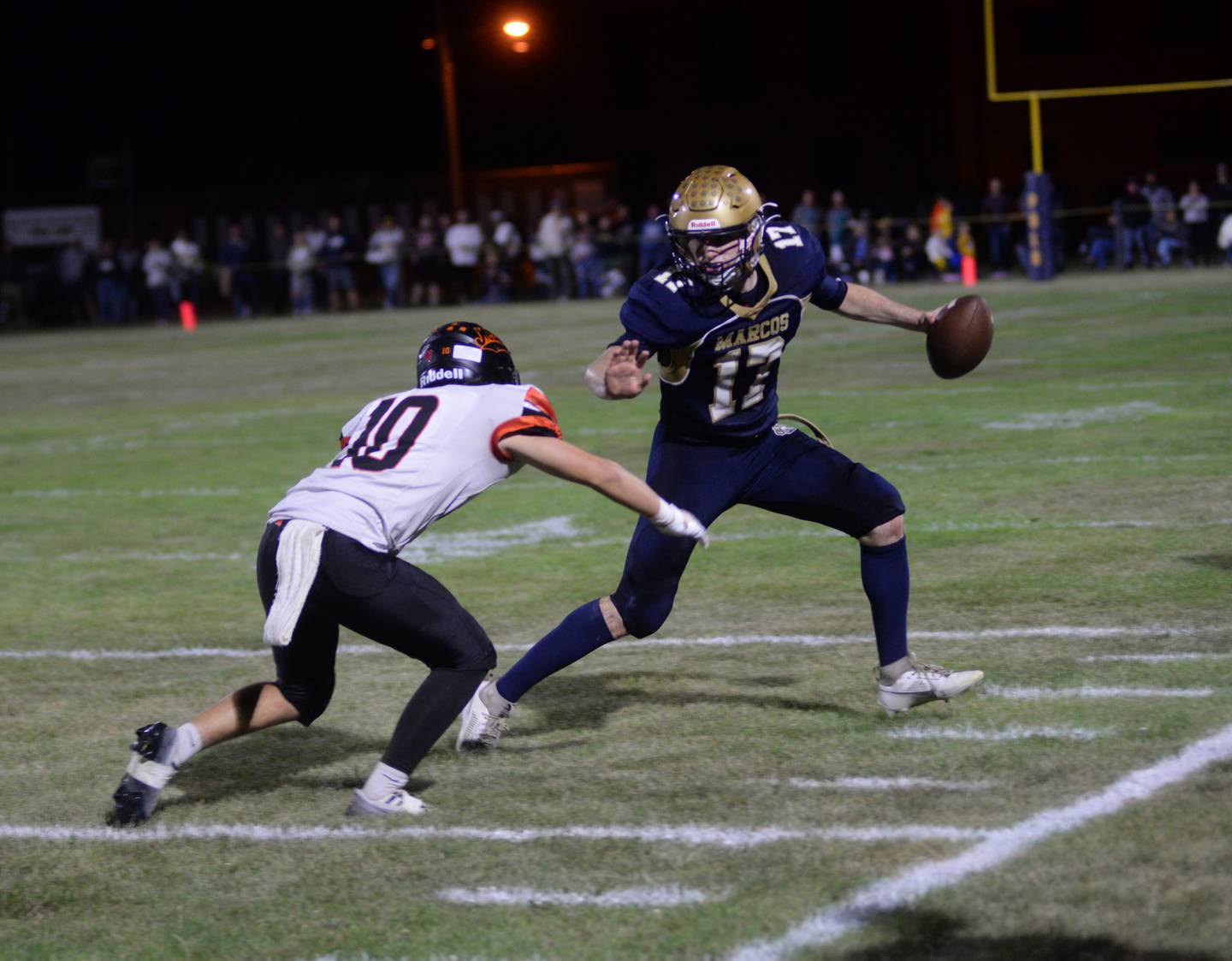 Polo's Brock Soltow (17) tries to avoid Milledgeville's Evan Schenck (10) during a Friday, Sept. 8, 2023 game at Polo High School.