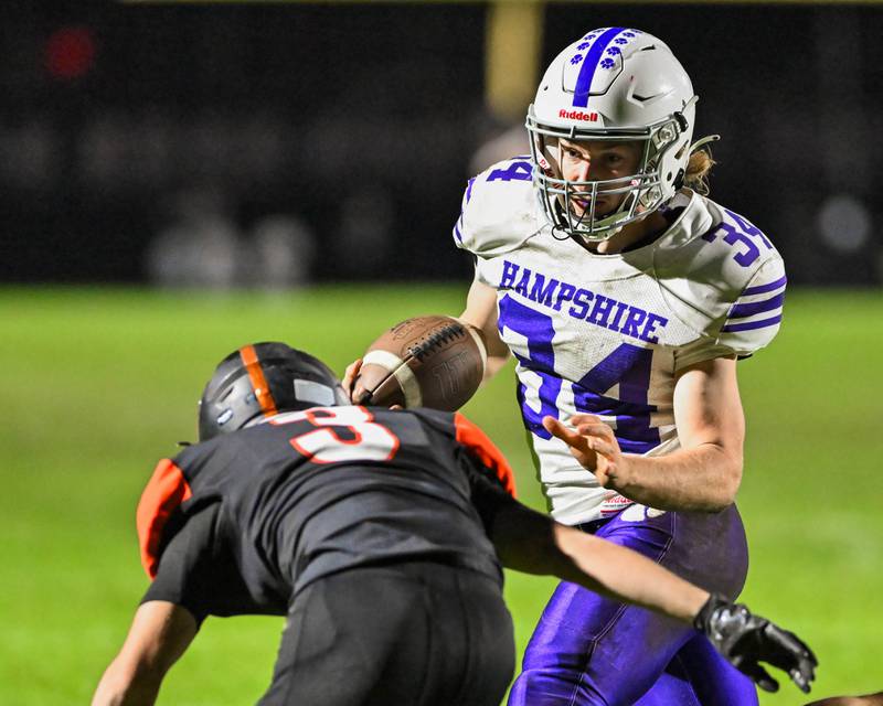 Hampshire's Cole Klawikoski attempts a run for the goal line late in the third quarter against Crystal Lake Central during their Fox Valley Conference game on Friday, Oct. 20, 2023 in Crystal Lake.