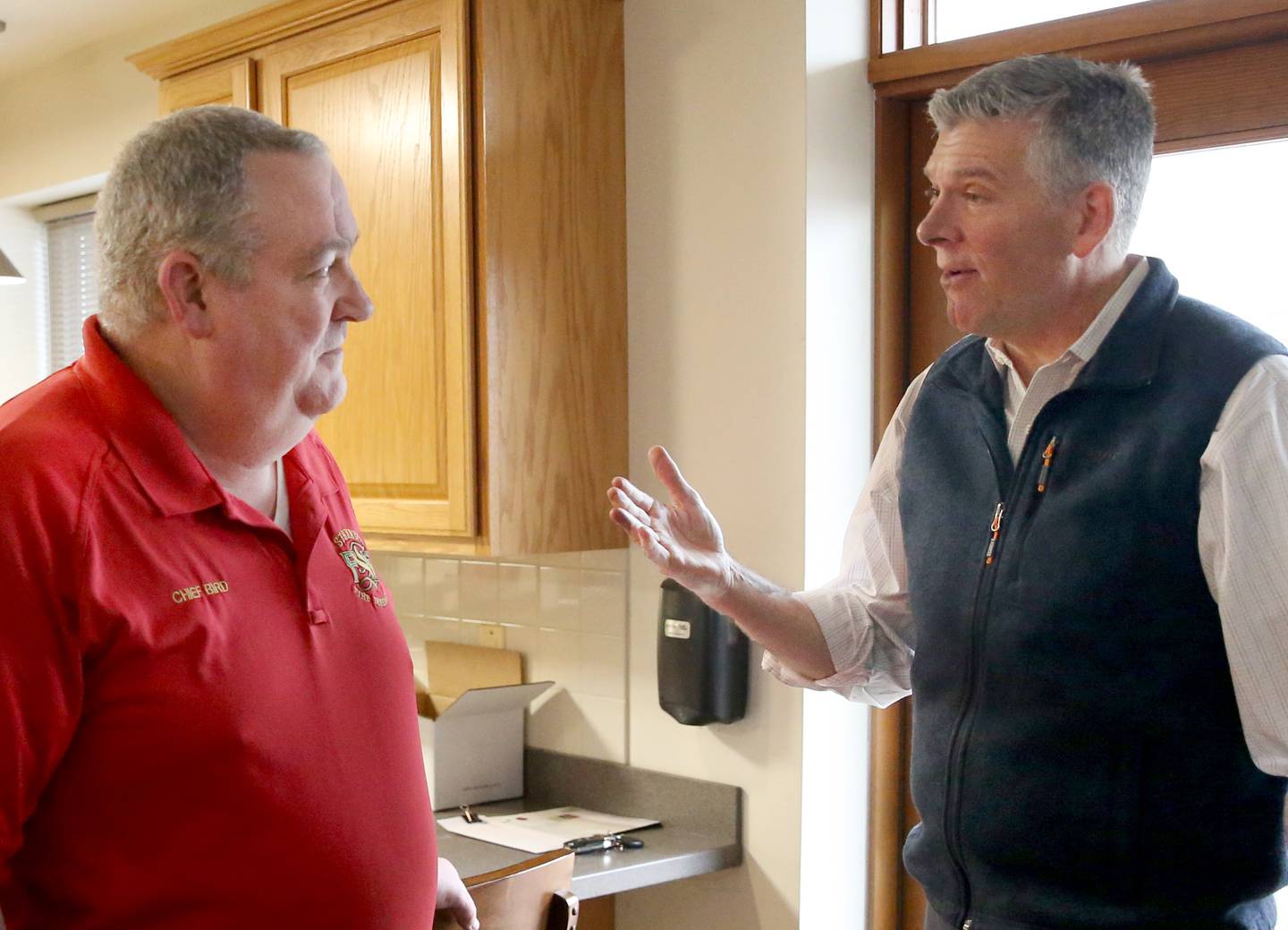 U.S. Rep. Darin LaHood (R-Illinois) meets with Streator Fire Chief Gary Bird as he tours the fire department on Tuesday, Feb. 14, 2023 in Streator.