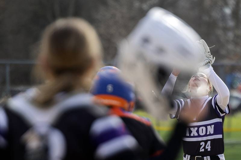 Dixon’s Abby Hicks camps under a pop-up against Genoa-Kingston Monday, April 7, 2025.