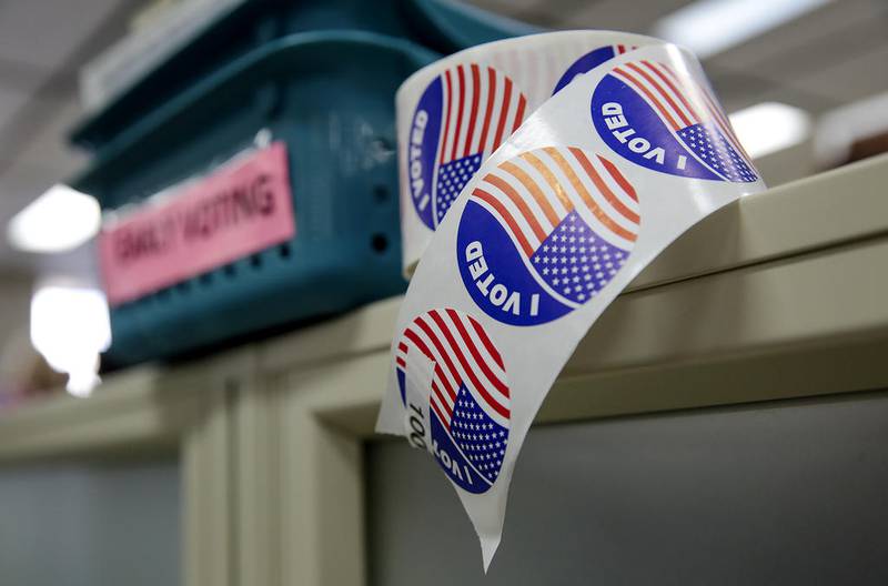 A roll of "I Voted" stickers sit behind a counter at the Will County Clerk's Office on Monday, Nov. 7, at the Will County Office Building in Joliet.