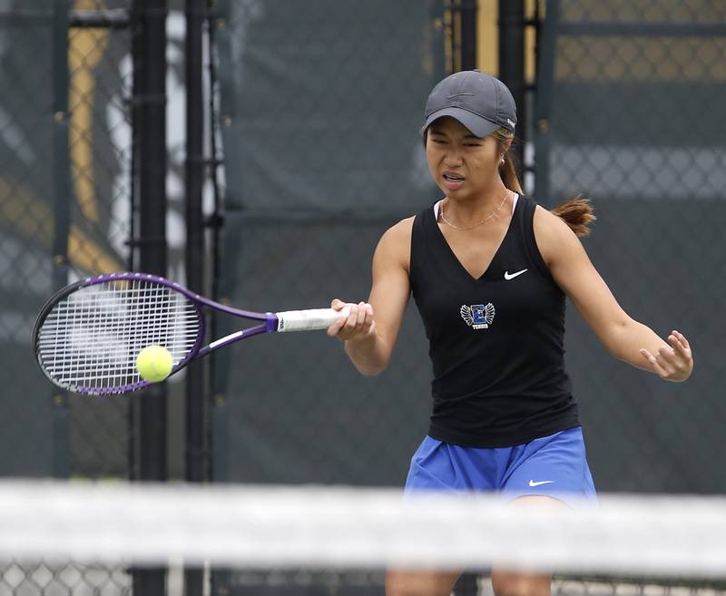 Lincoln Way East’s Elaiza Deanching returns the ball Thursday, Oct. 19, 2023, during doubles match on the first day of the IHSA State Girls Tennis Tournament at Elk Grove High School in Elk Grove Village.