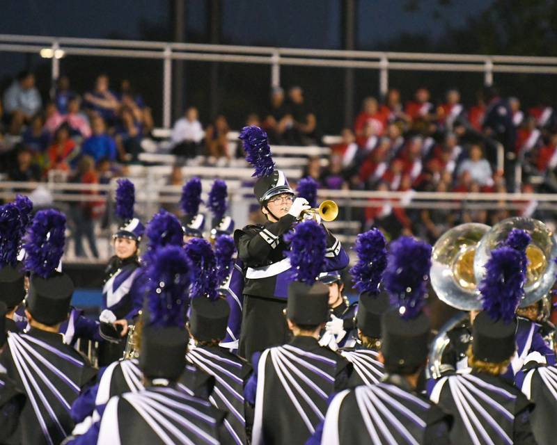 Downers Grove North’s marching band member Rhys Kanthack starts the showoff on Saturday Oct. 5, 2024, during the Downers Grove Marching Mustang Music Bowl held at Downers Grove South football field.
