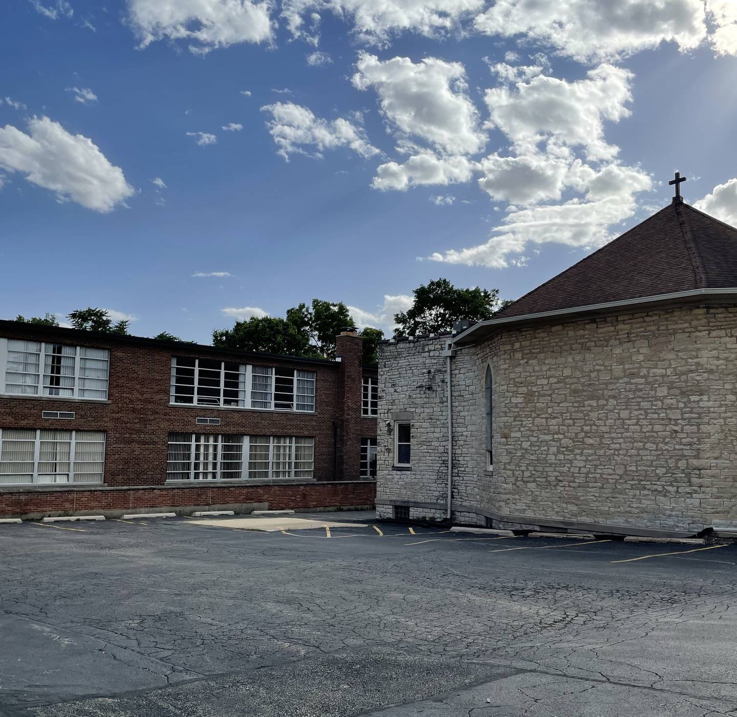 Sts. Dennis & Joseph Catholic Academy North Campus, 529 Madison St., Lockport on June 6, 2024.  The church (right) is adjacent to the school building.