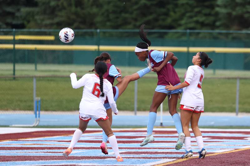 Kankakee's Alina Mkhwanazi attempts a header on goal during the Kays' 5-0 win against Blue Island Eisenhower in the Class 2A Kankakee Regional semifinals on Tuesday, May 19, 2026.