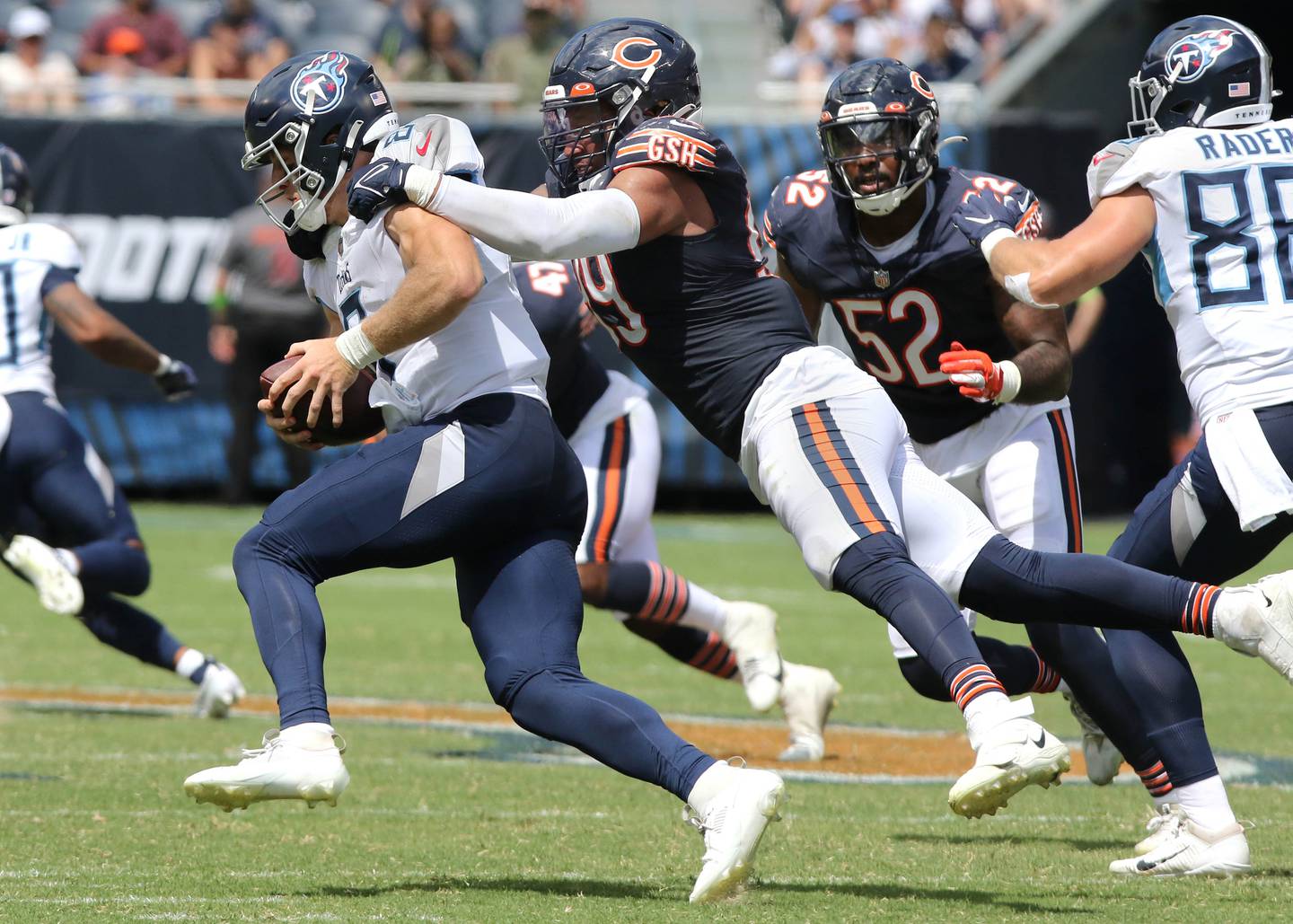 Chicago Bears linebacker Trevis Gipson sacks Tennessee Titans quarterback Will Levis during their preseason game Saturday, Aug. 12, 2023, at Soldier Field in Chicago.