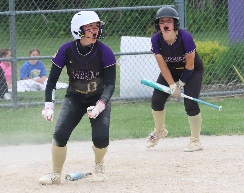 Serena's Brynley Glade reacts with teammate Finley Brodbeck after scoring the teams first run during the Class 1A Regional title game on Friday, May 22, 2026 at Serena High School.