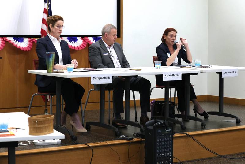 Democratic candidates, Carolyn Zasada, (left) Cohen Barnes and Amy Murri Briel, (right) all vying for the nomination for the 76th district seat in the Illinois House of Representatives, answered questions Saturday, Feb. 3, 2024, in a meet the candidates forum at the DeKalb Public Library. The forum was organized by DeKalb Stands and co-sponsored by the DeKalb County Democrats.