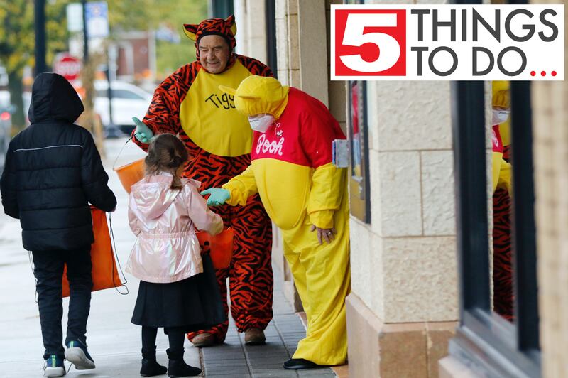 This 2021 file photo shows children trick-or-treating at the Raue Center for the Arts during the Halloween Handout event in Crystal Lake.