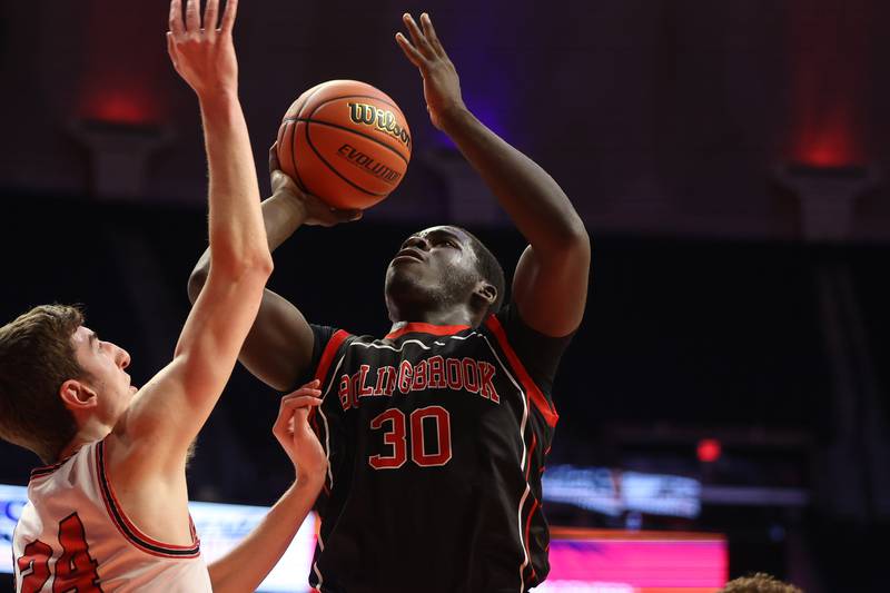Bolingbrook’s Michael Osei-Bonsu puts up a shot against Barrington in the Class 4A 3rd place match at State Farm Center in Champaign. Friday, Mar. 11, 2022, in Champaign.