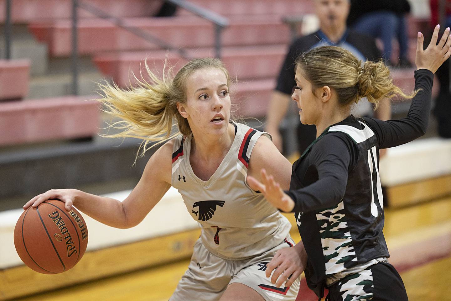 Sauk Valley’s Caylyn Kimmel works against Kishwaukee’s Kira Klapprodt Thursday, Jan. 12, 2023.