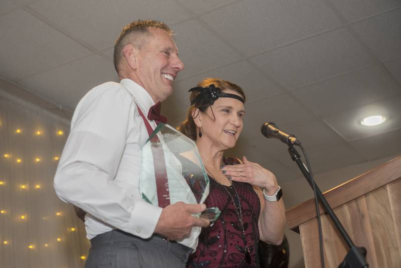 Tim and Patty Oliver accept the award for Business of the Year for Oliver's Corner Market Friday, May 6, 2022.
