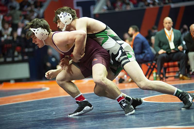 Brother Rice's Tom Bennett looks to get away from Grays Lake Central's Aaron Cramer during the 2A 170lb finals match at the IHSA state wrestling meet on Saturday, Feb. 19, 2022.
