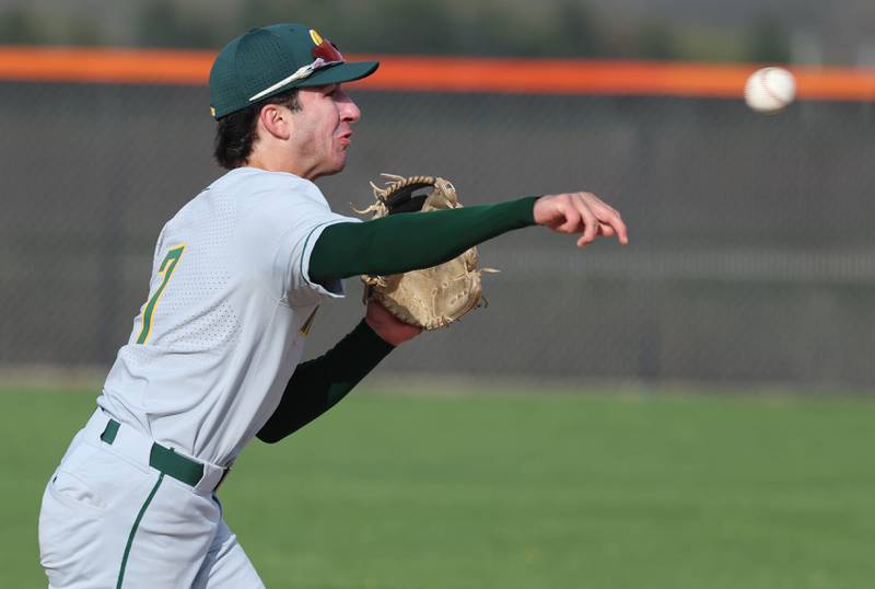 Waubonsie Valley's Ryan Lucas fires the ball across the diamond Monday, April 20, 2026, during their game at DeKalb High School.
