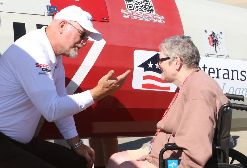 Pilot Darryl Fisher, talks with Veteran LeeAnn Joyce of Princeton, after flying in a 1942 Boeing Stearman A-75 Primary Trainer during a Veteran Dream Flight on Tuesday, Sept 2, 2025 at the Illinois Valley Regional Airport in Peru.