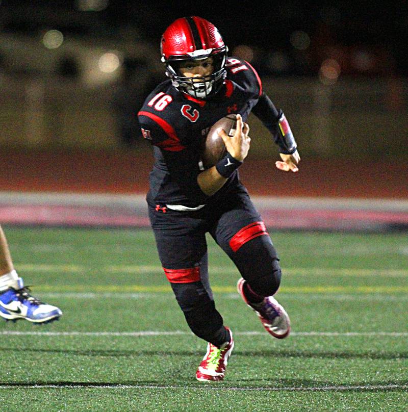 Huntley’s Braylon Bower runs the ball against Burlington Central in varsity football at Huntley High School in Huntley on Friday, Oct. 25, 2024.