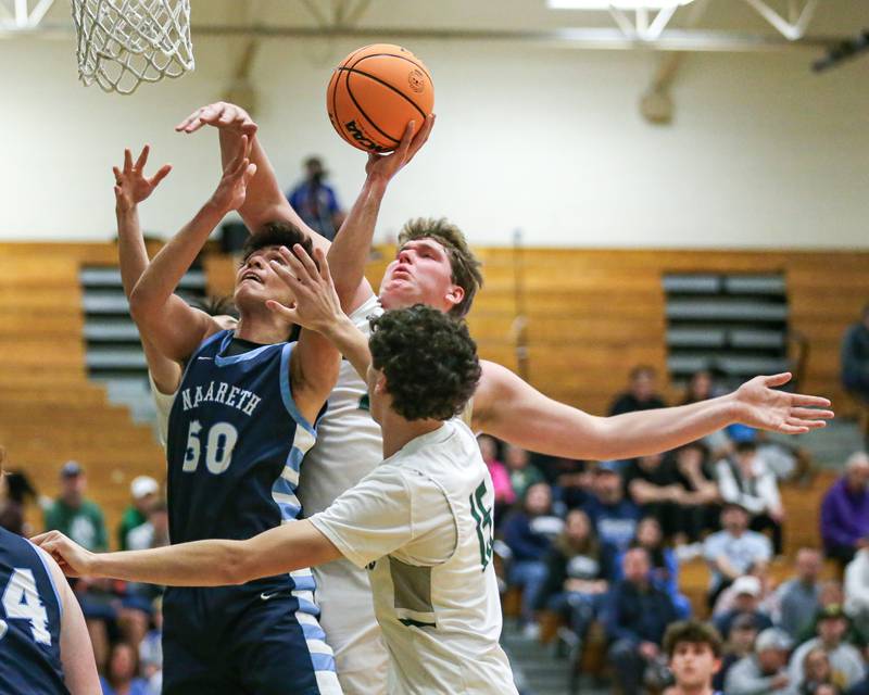 Nazareth's Kerem Tokdemir (50) puts up a contested shot during their Jack Tosh Holiday Classic basketball tournament game between Nazareth vs Glenbard West. Thursday Dec 26, 2024 in Elmhurst.