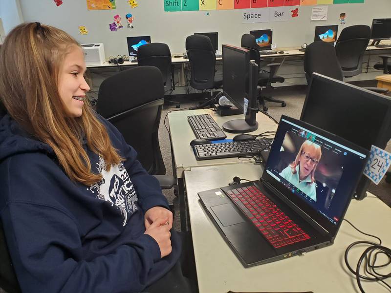 Maddie McBride, an eighth grade student at Trinity Christian School in Shorewood, listens to Geraldine Richmond, the undersecretary for science and innovation from The United States Department of Energy, speaker at the 20th anniversary event of “Introduce a Girl to Engineering Day" at Argonne National Laboratory.