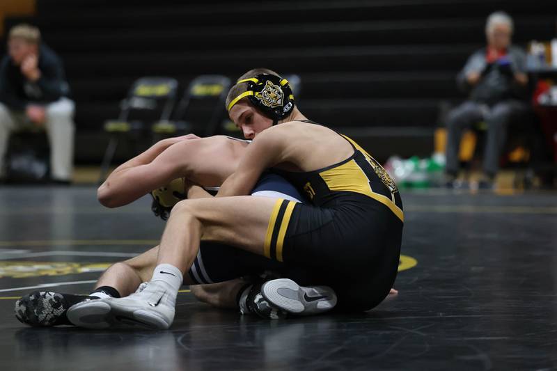Joliet West’s Nick Murdock-Schey works against Plainfield South’s in the 120 pound match on Wednesday, Dec. 3, 2025 in Joliet.